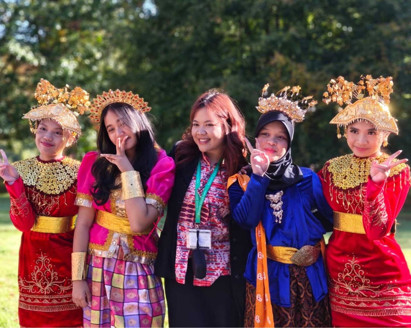 Students in traditional dress at a cultural event