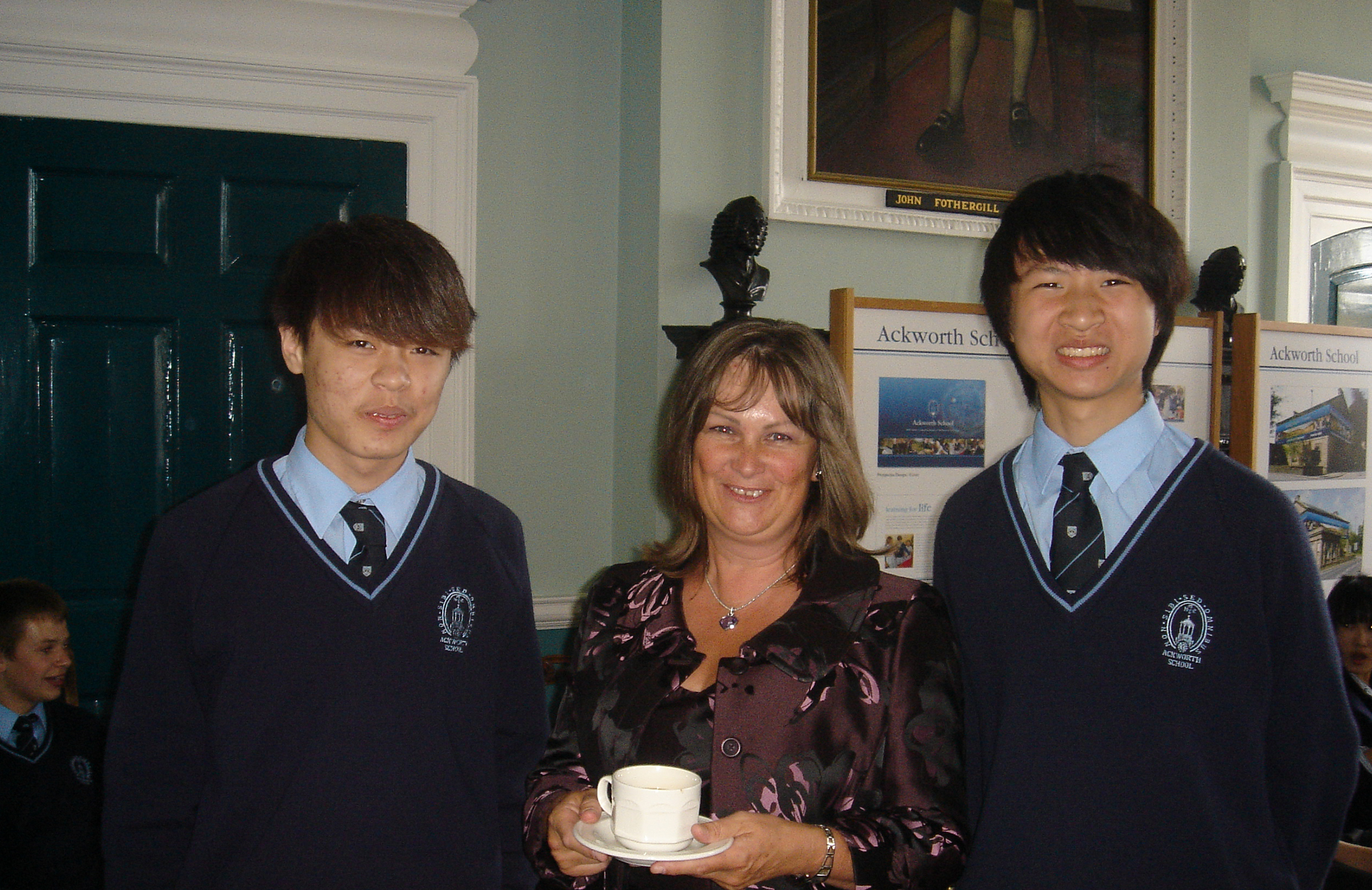 Study Links Angela Fan with guardianship students Alex and Allen at Ackworth School International Center Graduation